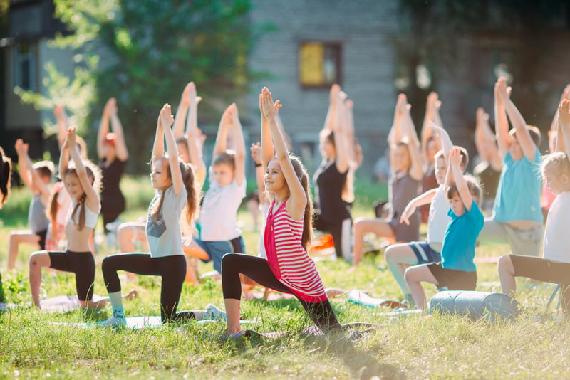 Yoga classes outside on the open air. Kids Yoga,